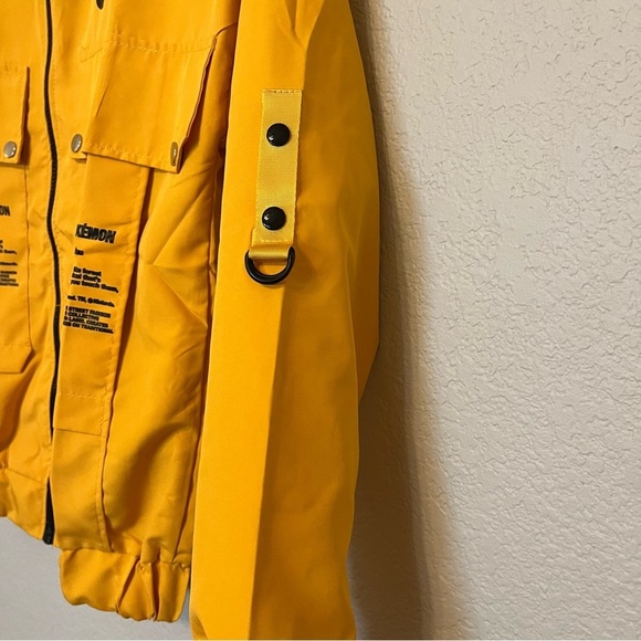 Nike 10 Deep X Pokemon Pikachu Trainer Yellow Windbreaker Jacket Medium - Picture 6 of 13